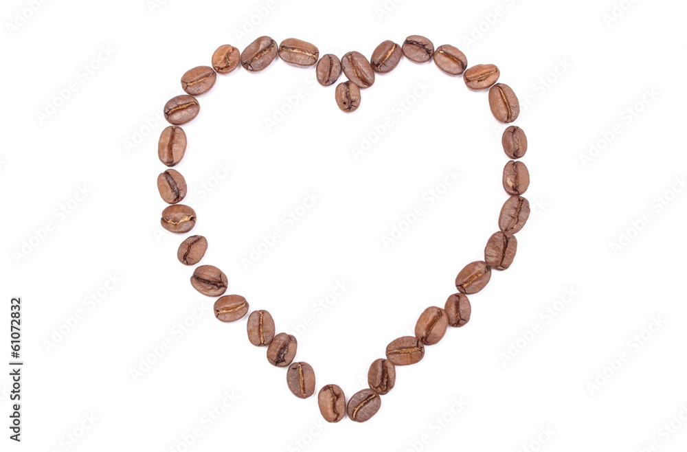 Heart shaped coffee beans on white background Heart shaped coffee beans on white background