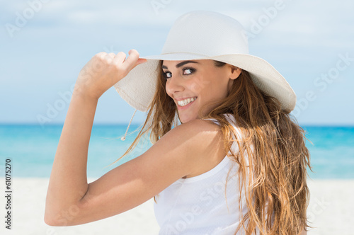 Girl With White Hat At Beach