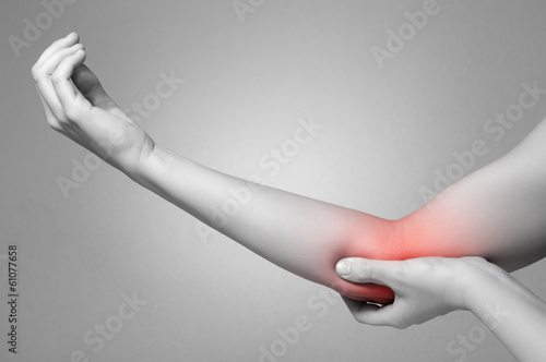 Woman with elbow pain photo