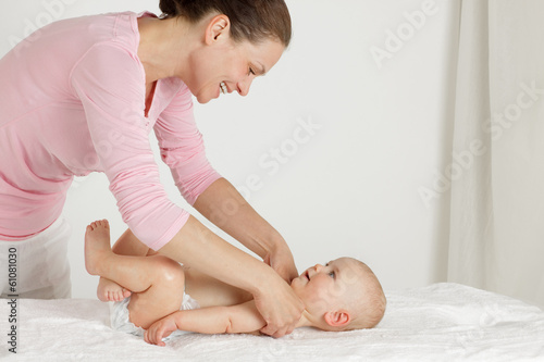 Massage therapist with her little patient.