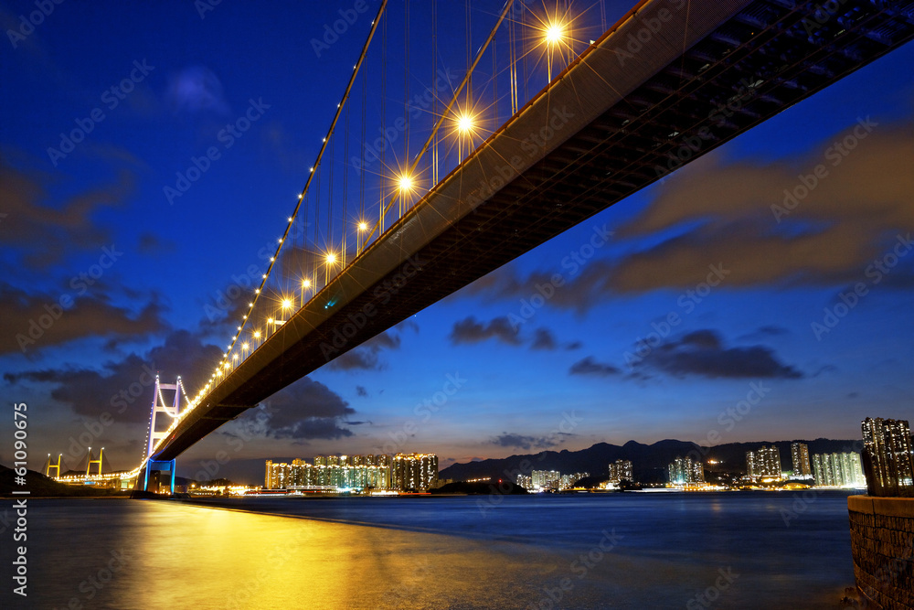 Fototapeta premium long Bridge over sunrise in hongkong