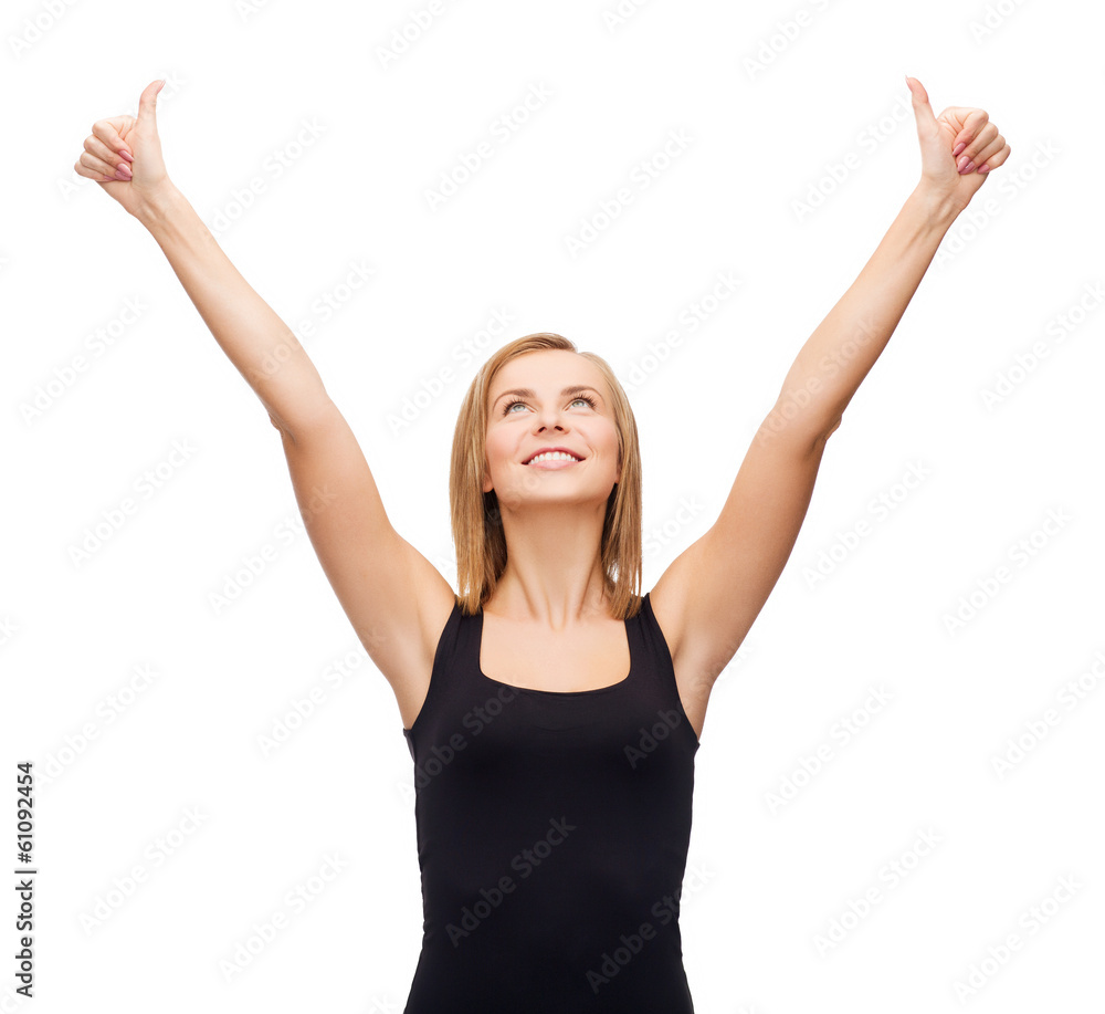 woman in blank black tank top showing thumbs up