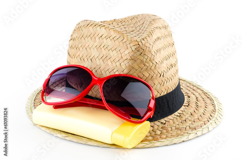 Hat , sunglasses , body lotion isolated on white background
