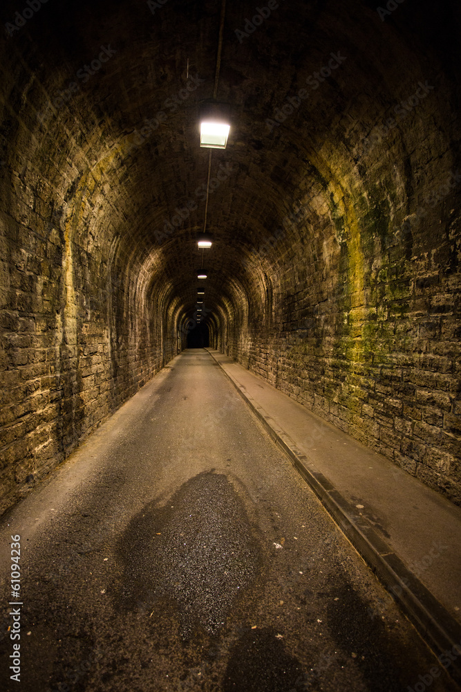 Old vintage tunnel in Biarritz at night
