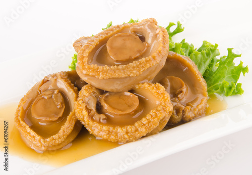 Abalones. Chinese cuisine abalone on background.