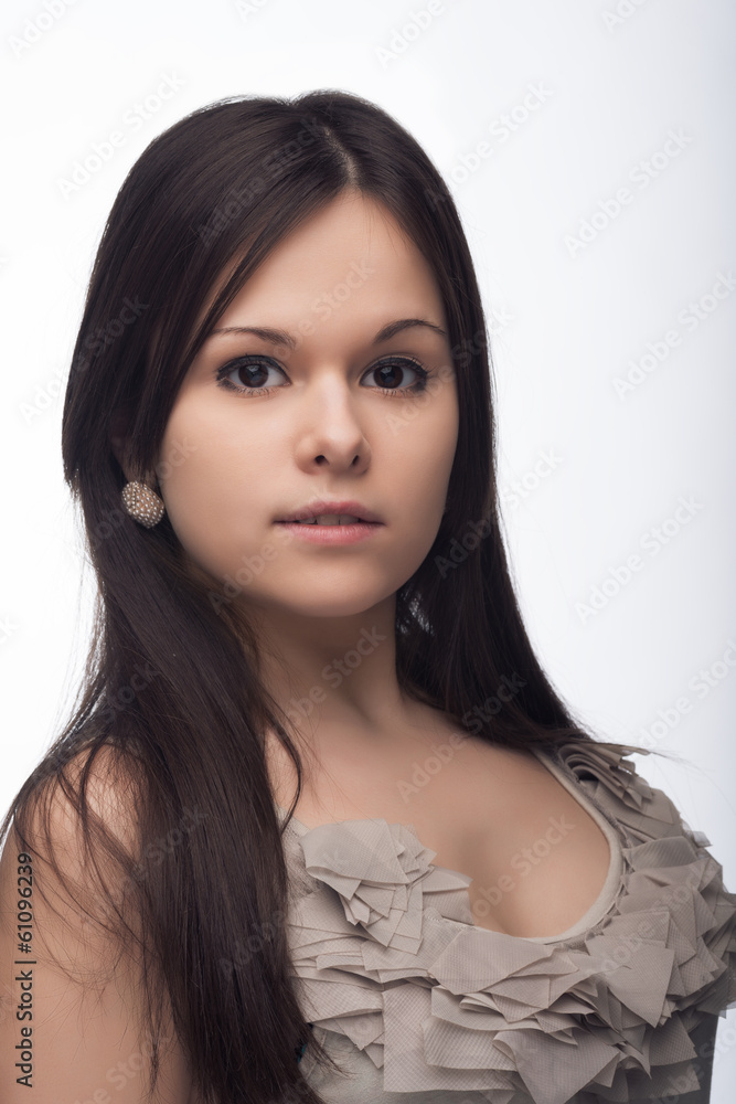 Fototapeta premium Tender portrait of a girl with long hair
