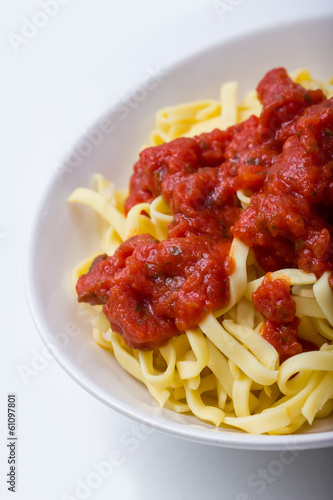 bowl of pasta with tomatoe sauce