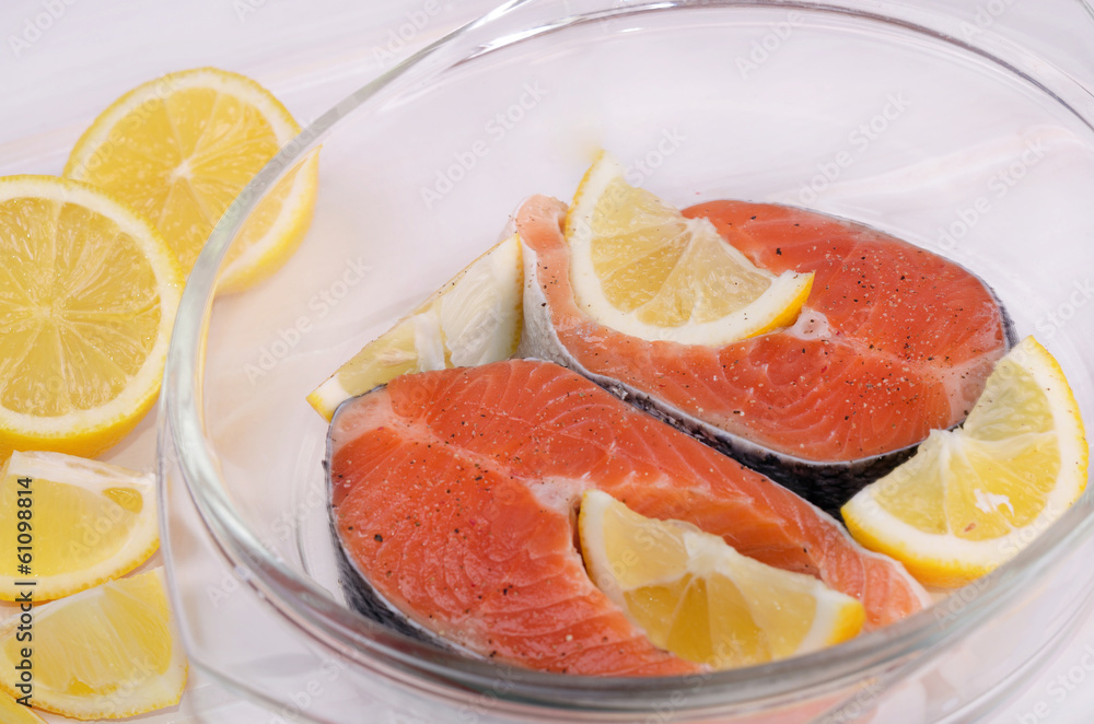 Raw trout steaks with lemon