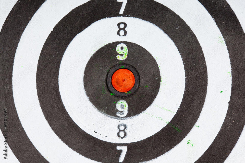 Closeup of old dirty black and white target as sport background Closeup of old dirty black and white target as sport background