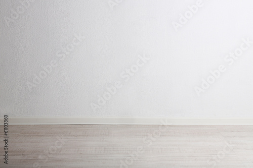 Empty room with wall and wooden floor