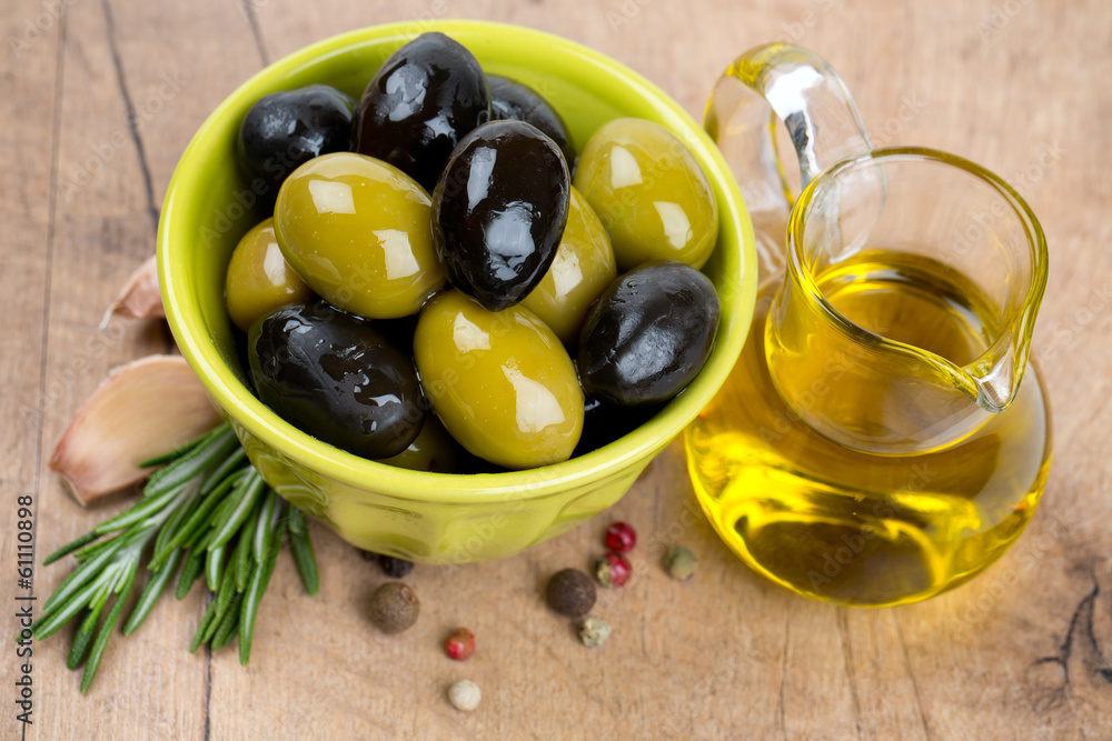 green and black olives in a green oil green and black olives in a green oil