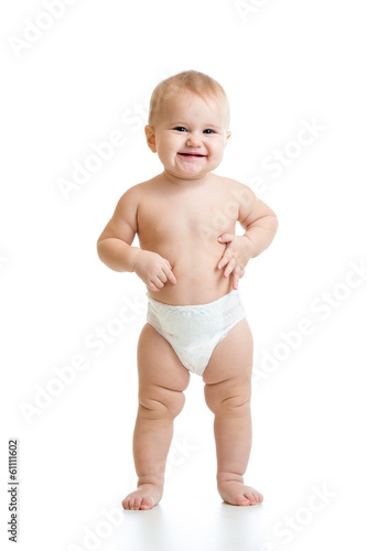 standing baby girl isolated...