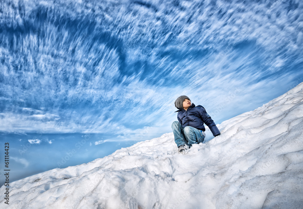 Cool Asian boy playing in snow Cool Asian boy playing in snow