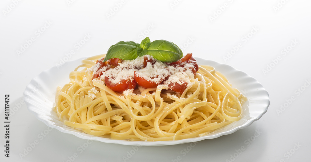 dish with spaghetti and tomato souce dish with spaghetti and tomato souce