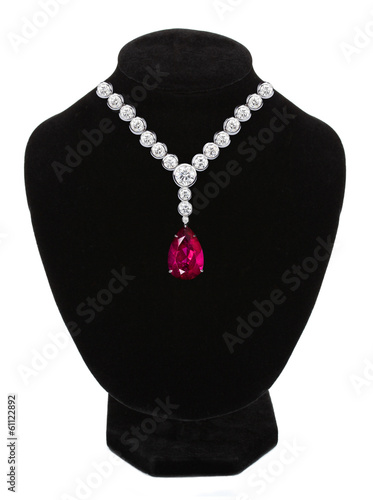 Diamond and ruby necklace on black mannequin isolated on white