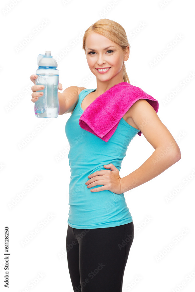 sporty woman with towel and watel bottle sporty woman with towel and watel bottle