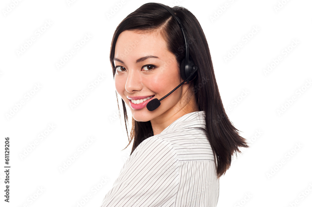 Smiling attractive call center executive Smiling attractive call center executive