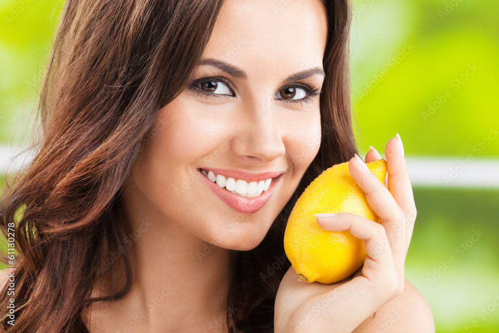 Young happy smiling woman with limon, outdoor Young happy smiling woman with limon, outdoor
