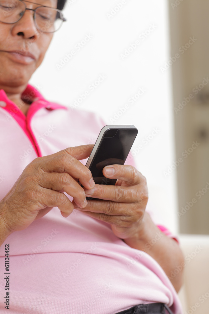 Senior man using phone