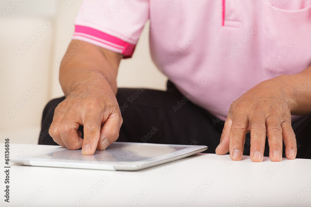 Senior man using digital tablet Senior man using digital tablet