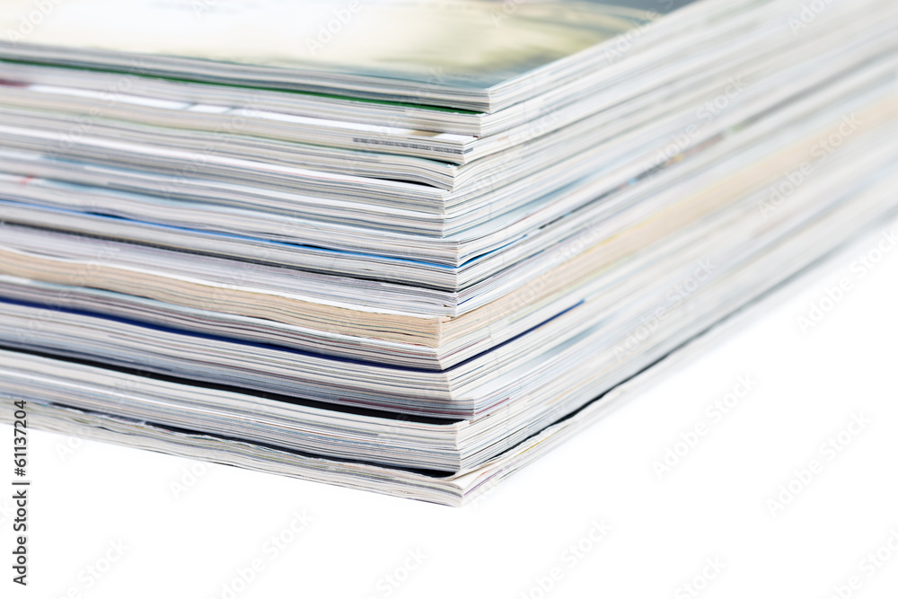close-ups of stack of colorful magazines close-ups of stack of colorful magazines
