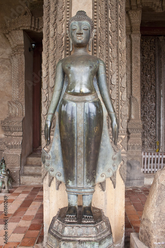 Statue at Haw Pha Kaew temple in Vientiane, Laos photo