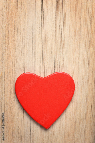 Red heart on book s pages background