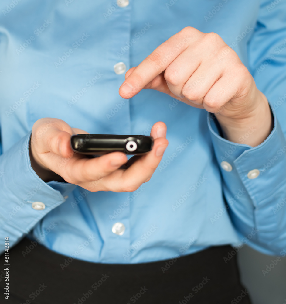 Close up of a woman using mobile smart phone Close up of a woman using mobile smart phone