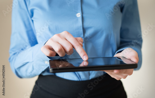 woman uses a digital tablet © slasnyi
