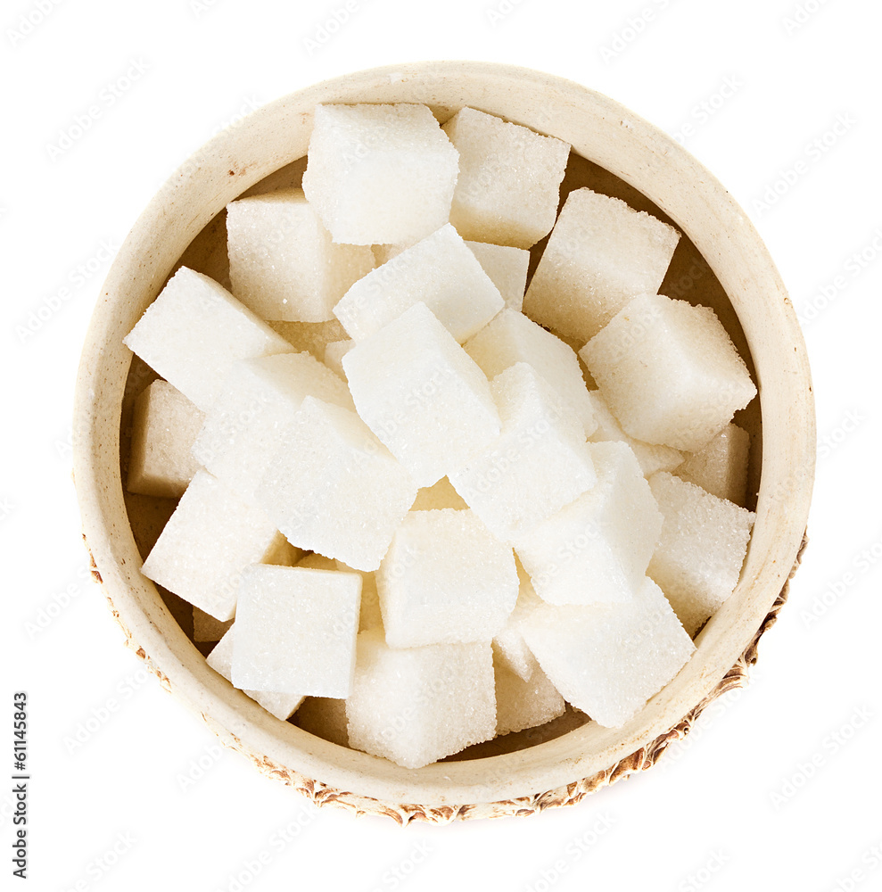 Sugar cubes in a bowl isolated on white background Sugar cubes in a bowl isolated on white background