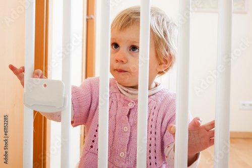 Girl near stair gate