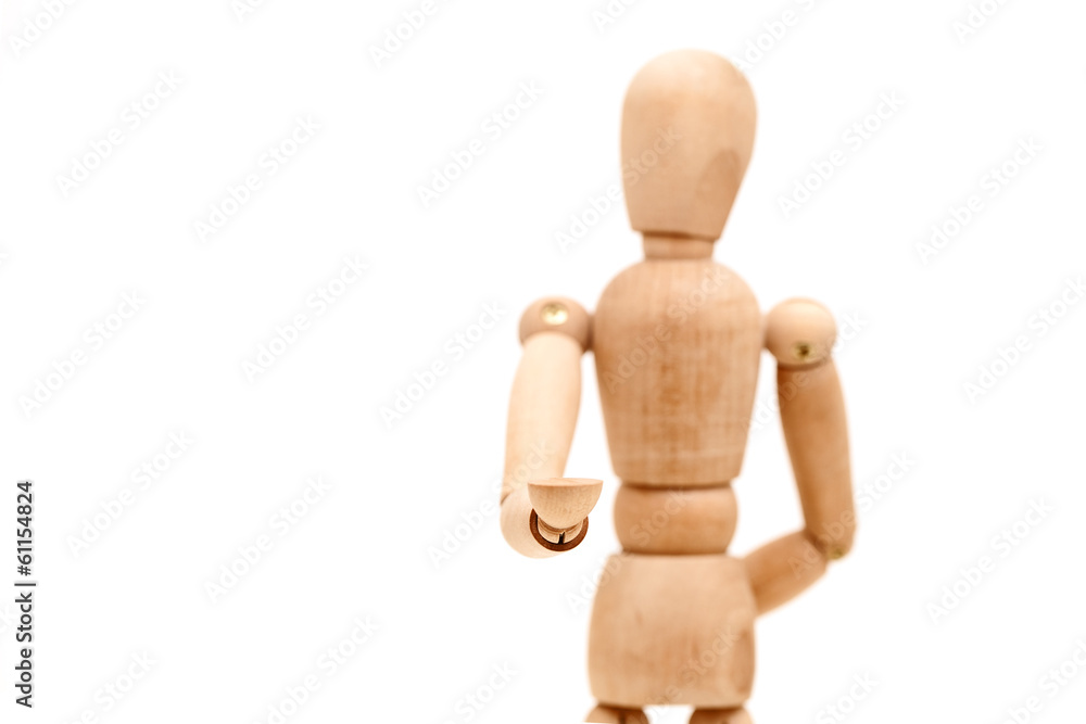Wooden dummy proudly presents thing, isolated on white backgrou Wooden dummy proudly presents thing, isolated on white backgrou
