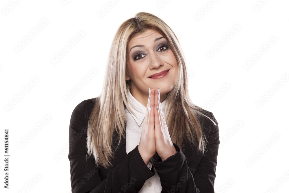portrait of a young business woman who begs for forgiveness portrait of a young business woman who begs for forgiveness