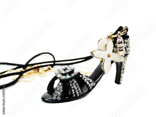 gold pendant shoe shape with diamond crystals photo