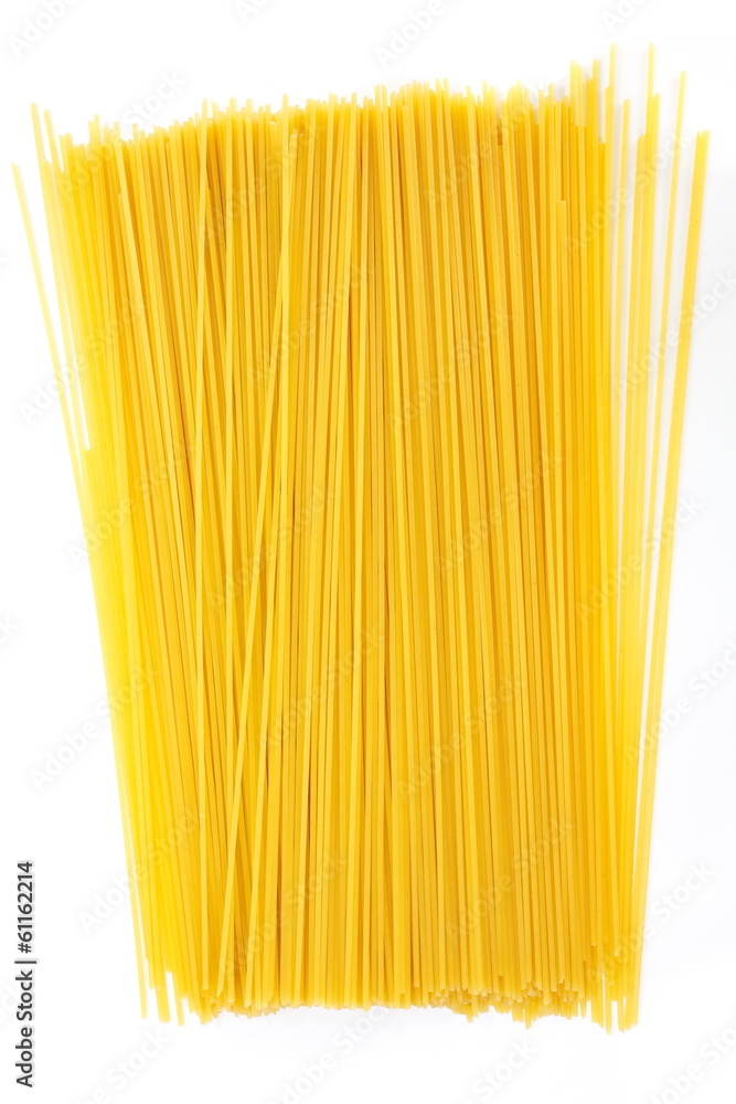 Uncooked Italian spaghetti on a white background Uncooked Italian spaghetti on a white background