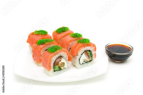 Japanese rolls and soy sauce isolated on a white background