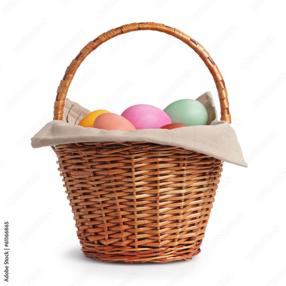 wicker basket full of pastel colors easter eggs