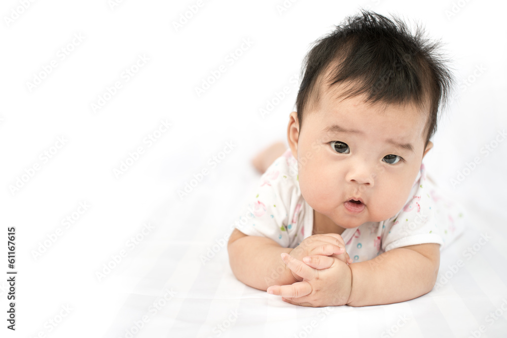 Asian baby girl on isolated white background Asian baby girl on isolated white background