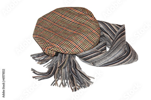 Retro-styled gentlemen`s tweed cap and scarf isolated