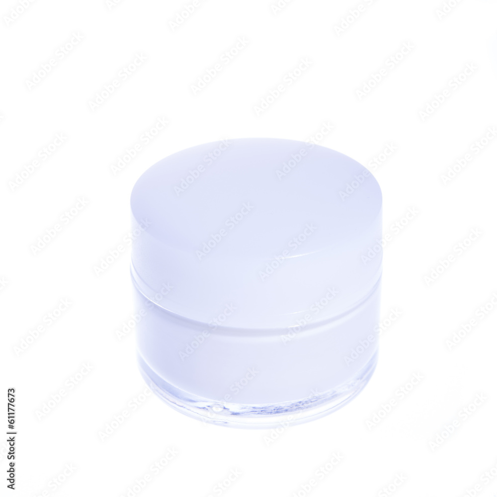 cosmetic cream in a glass jar with white cover cosmetic cream in a glass jar with white cover