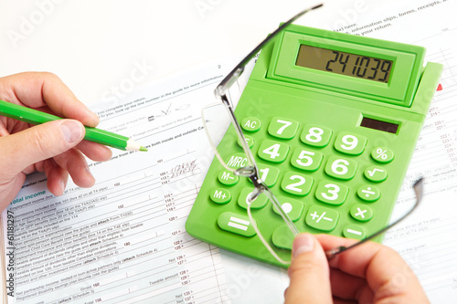 The businessman and green calculator