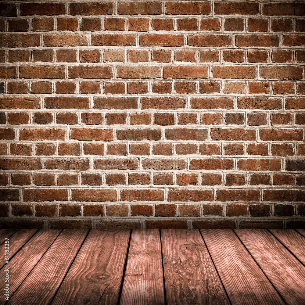 Red brick wall and wooden floor interior