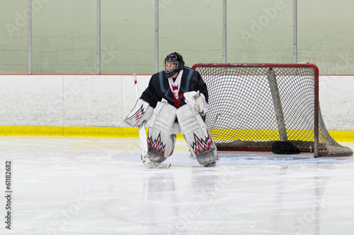 Goalie gets ready for the puck during an ice hockey game