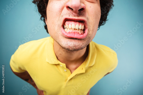 Man grinding his teeth photo