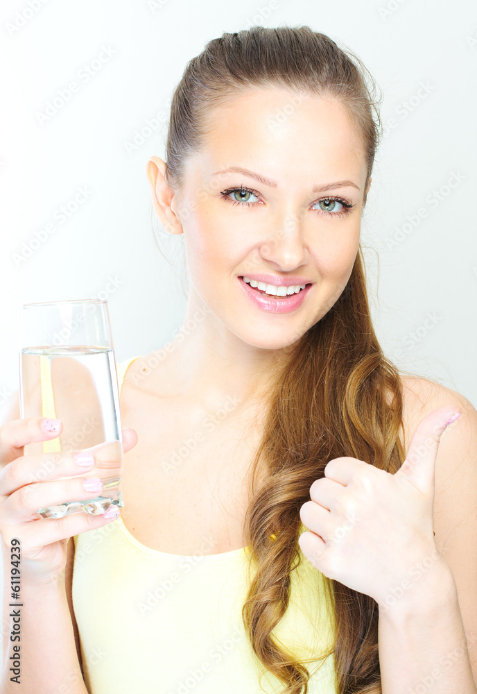 picture of beautiful woman with glass of water . picture of beautiful woman with glass of water .