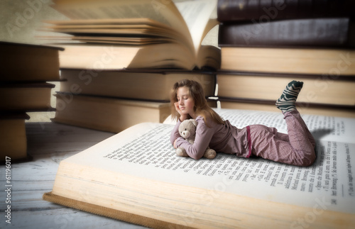 Little girl reading photo