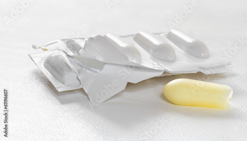 Package of suppository on white background