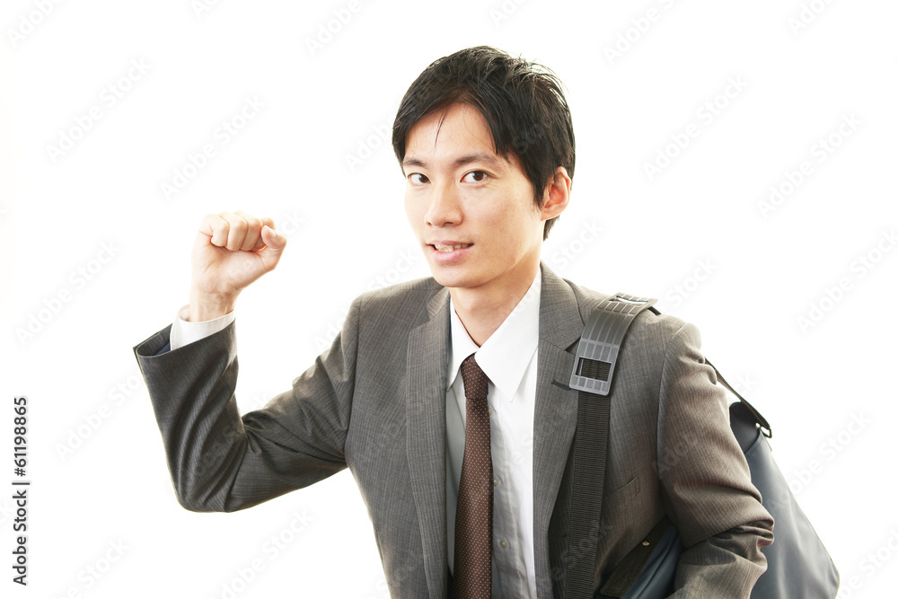 ガッツポーズのビジネスマン