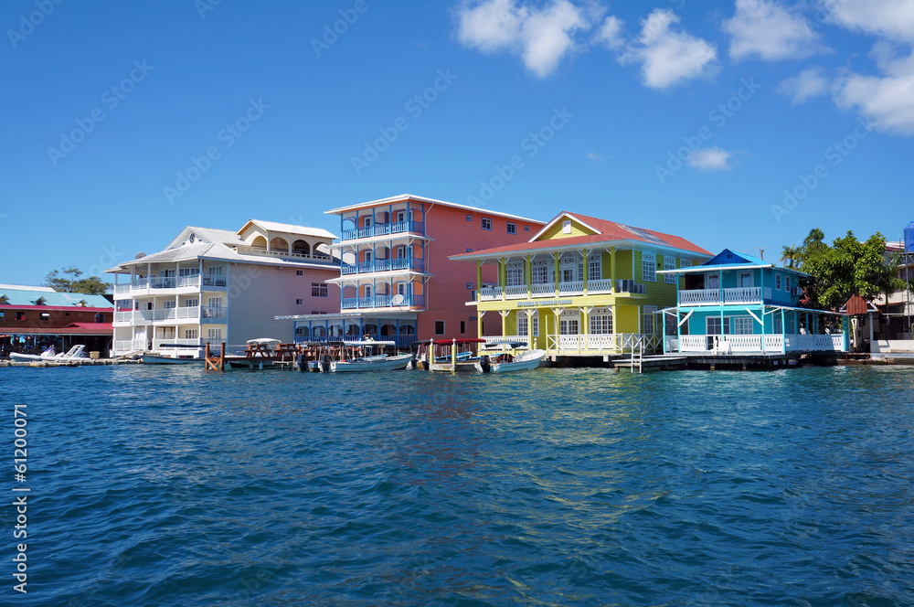 Colorful Caribbean buildings over the water