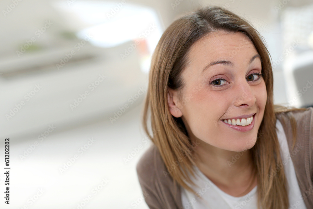 Portrait of brunette girl relaxing at home